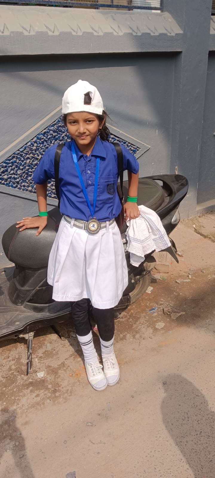 Student in Blue Uniform with Cap